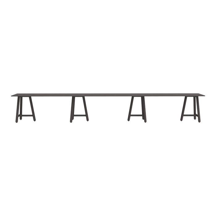 Long, sleek bench in deep black with minimalistic design and sturdy wooden legs. Ideal for modern spaces.