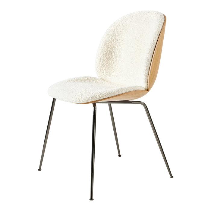 Elegant white chair with a textured fabric seat and natural wood back, supported by sleek black metal legs.