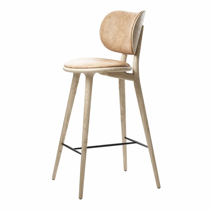 Light beige wooden bar stool with a smooth seat and rounded back, featuring natural wood grain and minimalist design.