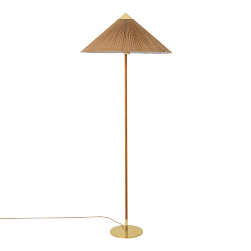 Tall floor lamp with a conical beige shade and a sleek gold base, offering a modern minimalist design.