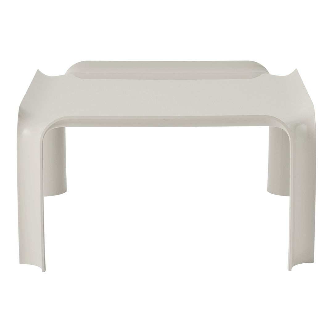 Modern white table with smooth, glossy surface and minimalist design for versatile decor. Perfect for any space.