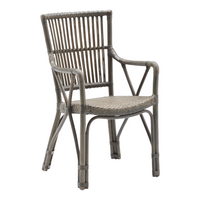 "Stylish gray woven chair with a natural rattan finish and striated backrest design."