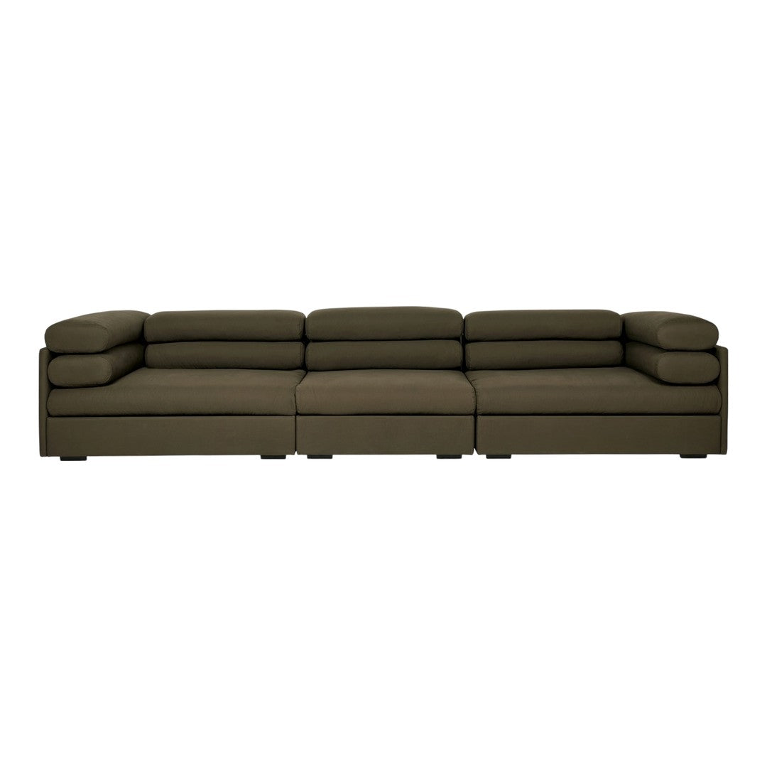 Olive green sectional sofa with a modern design and plush, smooth fabric upholstery.