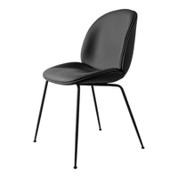 Stylish black chair with smooth surfaces and sleek black metal legs, perfect for modern decor.