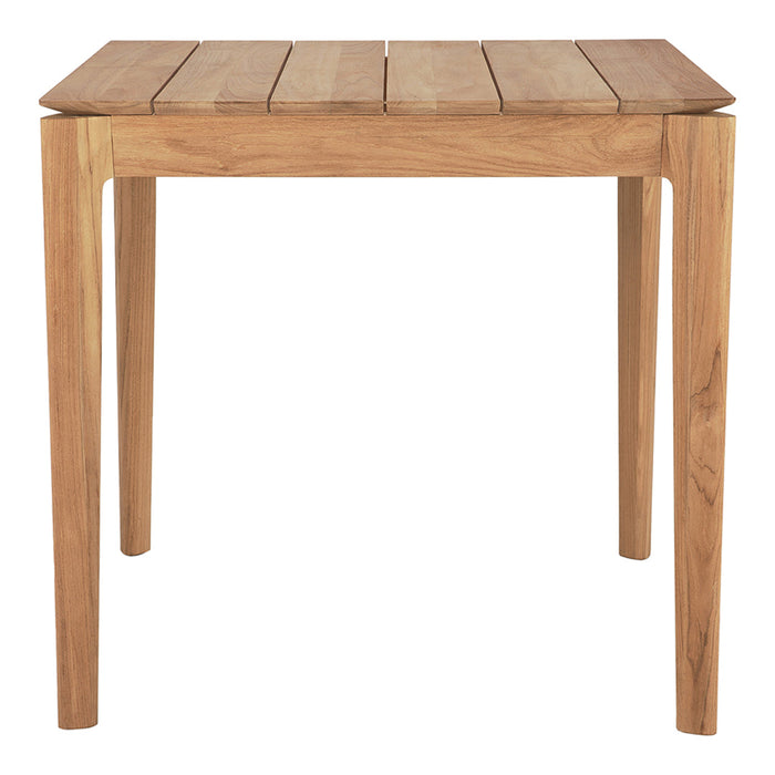 Light brown wooden table with a smooth, slatted surface and simple, modern design. Perfect for any decor.