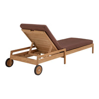 Brown cushion on a natural wood chaise lounge with minimalistic design and smooth lines, featuring wheels for mobility.