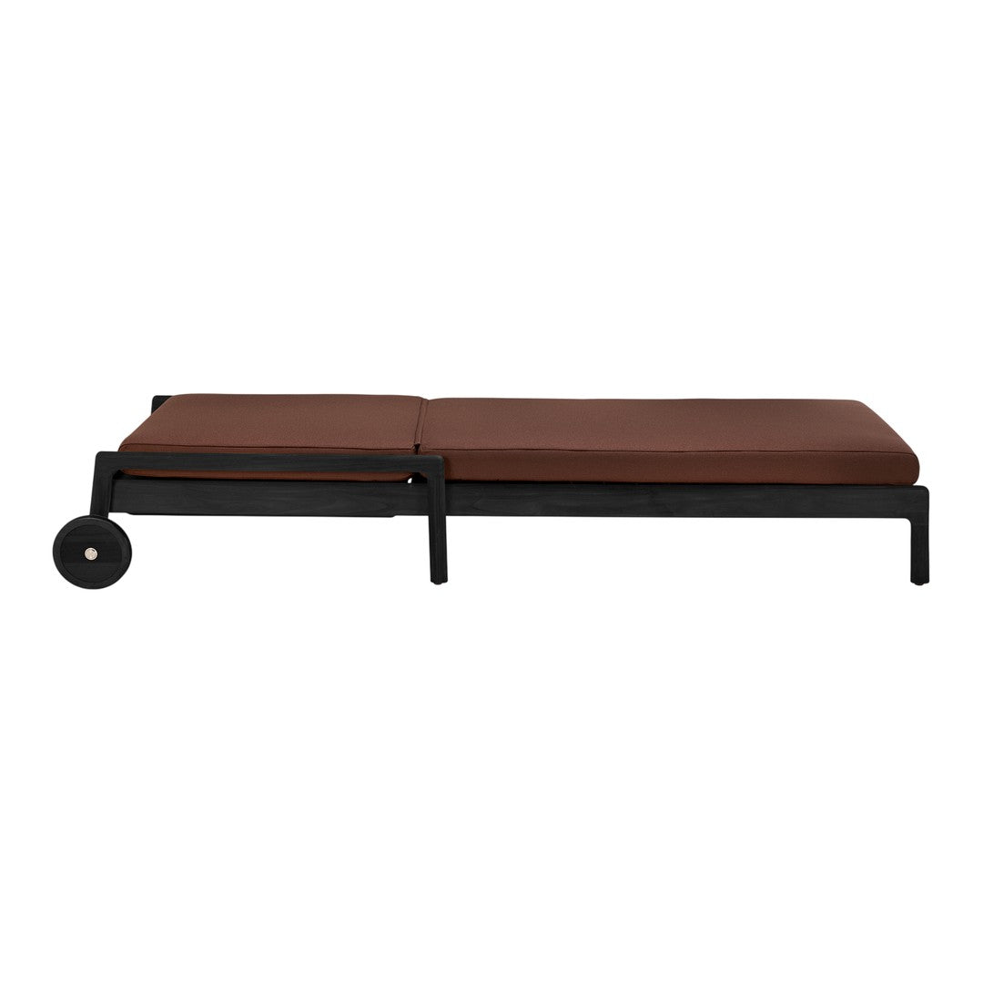 Brown cushioned lounge chair with a sleek black metal frame and minimalistic design. Perfect for outdoor relaxation.