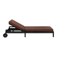 Brown cushioned chaise lounge on a sleek black frame with minimalistic design. Perfect for modern outdoor spaces.