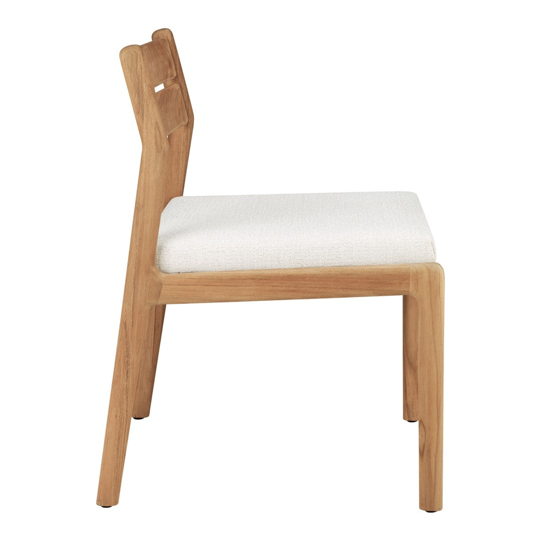 Natural wood chair with light beige fabric cushion, showcasing a minimalist design and modern, neutral color palette.