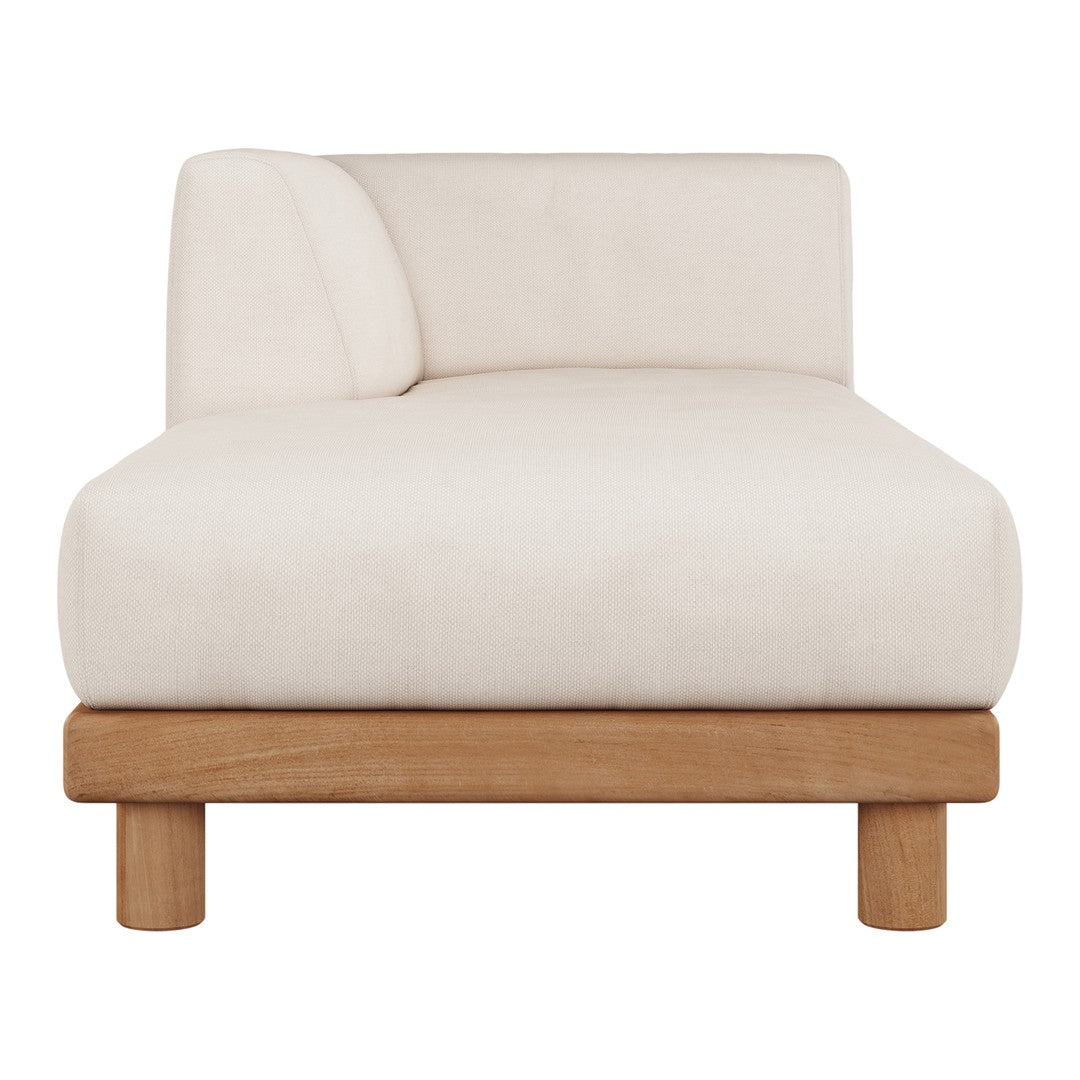 Beige upholstered chaise lounge with a minimalist design and light wood base. Soft, modern aesthetic perfect for any space.