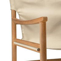 Cream-colored fabric with a smooth texture, complemented by a natural wood frame. Minimalist and elegant design.