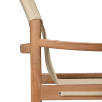 Natural wood chair frame with beige fabric accents, showcasing a minimalist design and soft color palette.