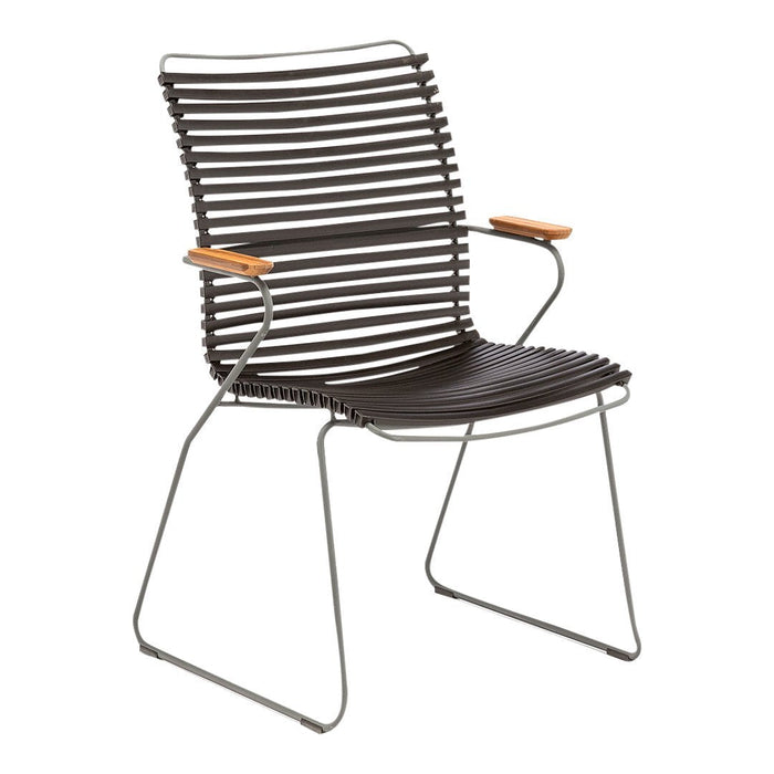 Black striped chair with a sleek metal frame and wooden armrests, featuring a modern, minimalist design.