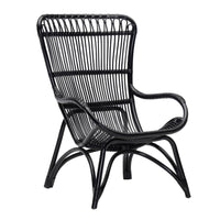 Black woven rattan chair featuring a sleek, modern design with open patterns and smooth curves. Perfect for stylish decor.