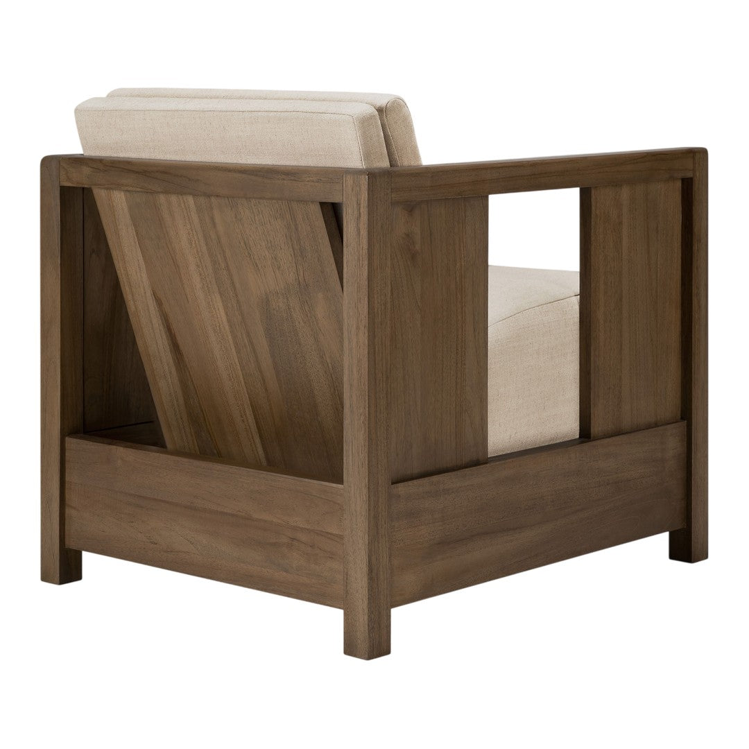 Neutral beige cushion on a sleek, natural wood framed armchair with clean lines and a modern design.