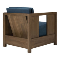 Blue upholstered chair with a sleek wooden frame and geometric cutouts, showcasing a modern design.
