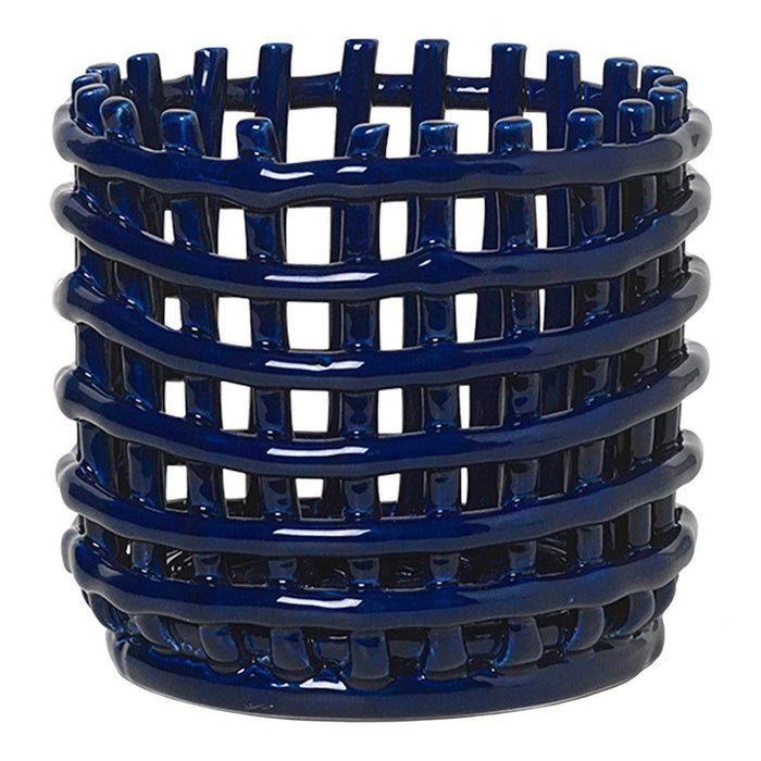 Navy blue woven basket with glossy finish and layered horizontal stripes. Ideal for home decor.