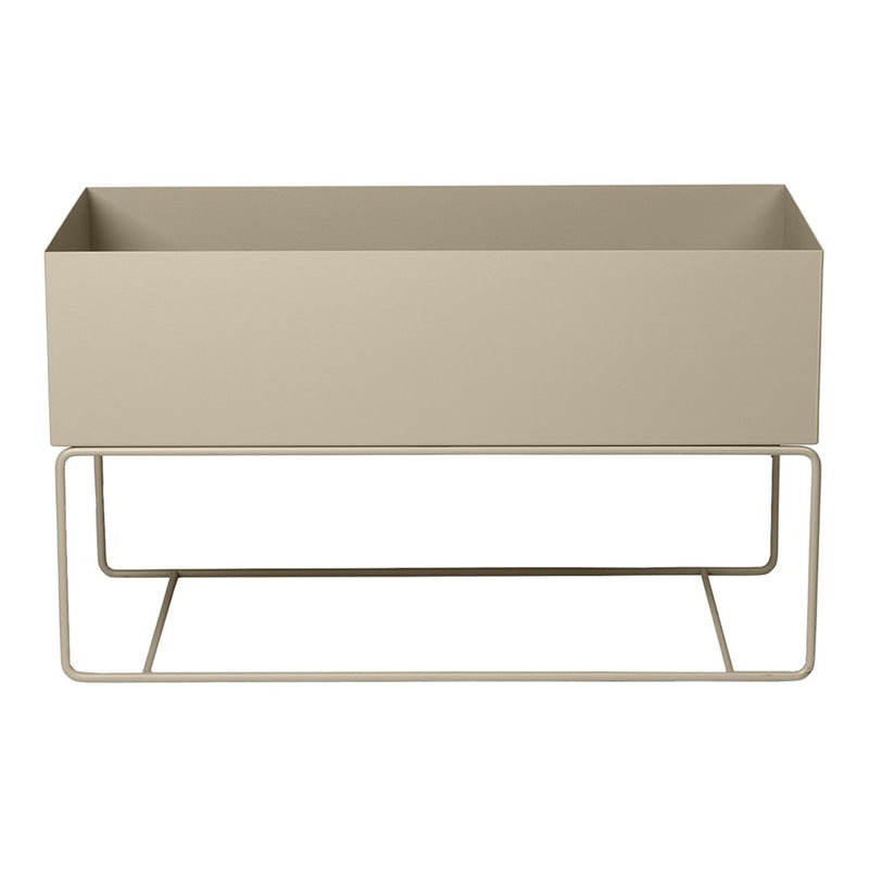 Beige rectangular planter with a minimalist design and a simple metal stand. Perfect for modern decor.