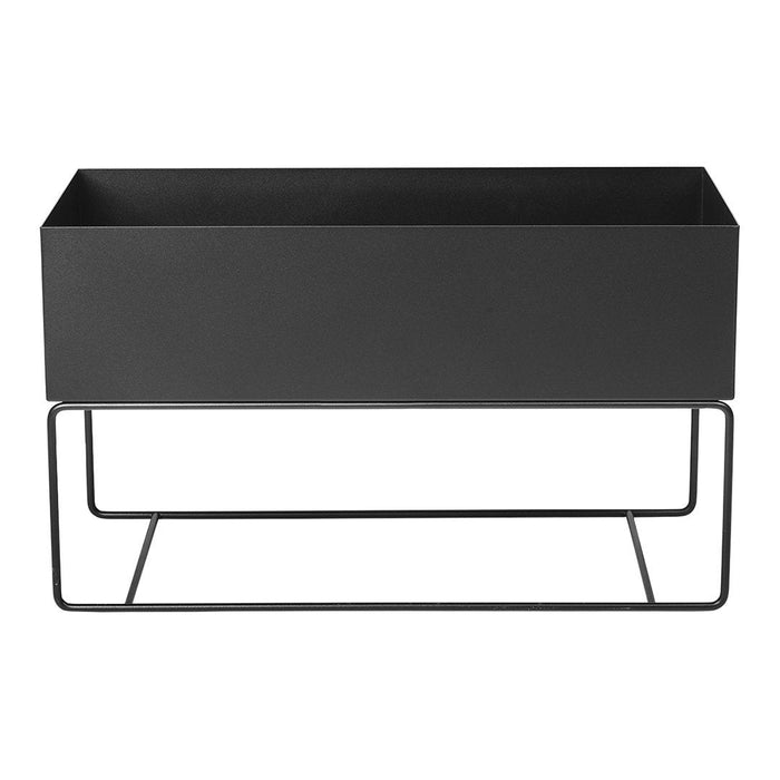 Sleek black rectangular planter with a minimalist design and black metal stand. Perfect for modern decor.