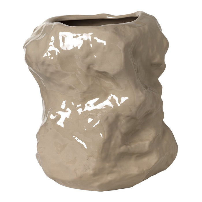 Beige textured ceramic vase with a glossy finish and organic, sculptural shape. Perfect for modern decor.