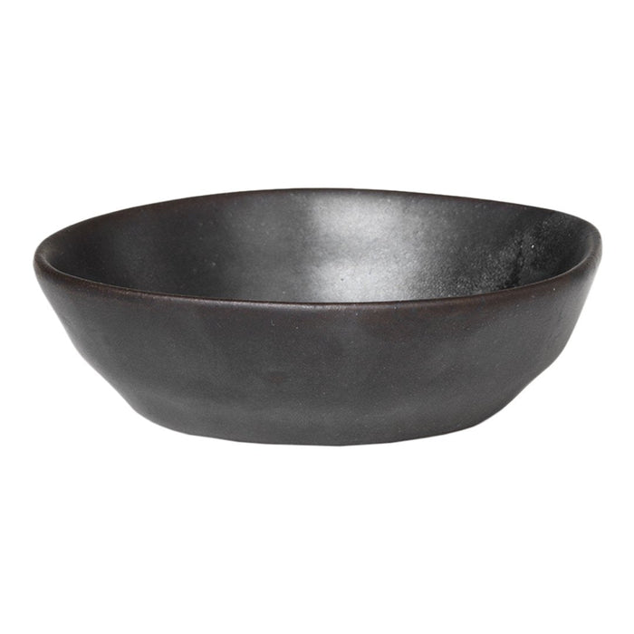 Handcrafted black ceramic bowl with a smooth, matte finish and a minimalist design. Perfect for modern dining.