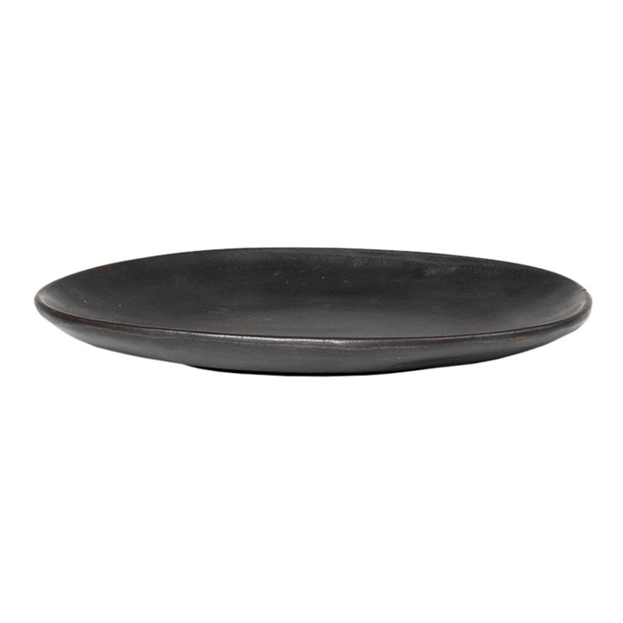 Black ceramic plate with a smooth, matte finish and a minimalist design, perfect for stylish table settings.