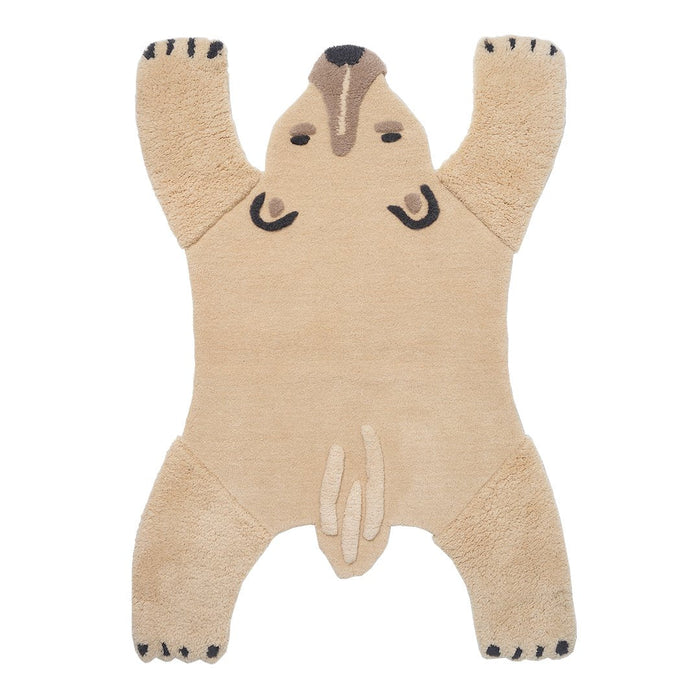 Beige bear-shaped rug with black accents and a textured, fluffy surface, perfect for playful decor.