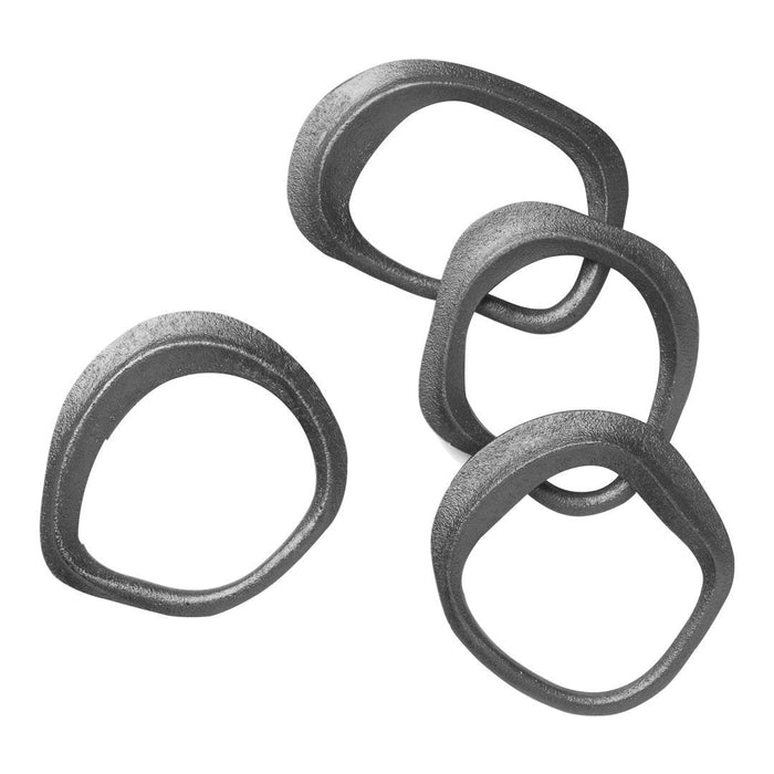 Set of four textured black rings with an irregular, wavy shape and matte finish, showcasing a modern design.