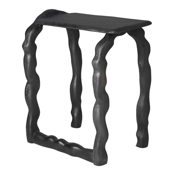 Black wavy side table with unique textured legs and a smooth top, perfect for modern decor.