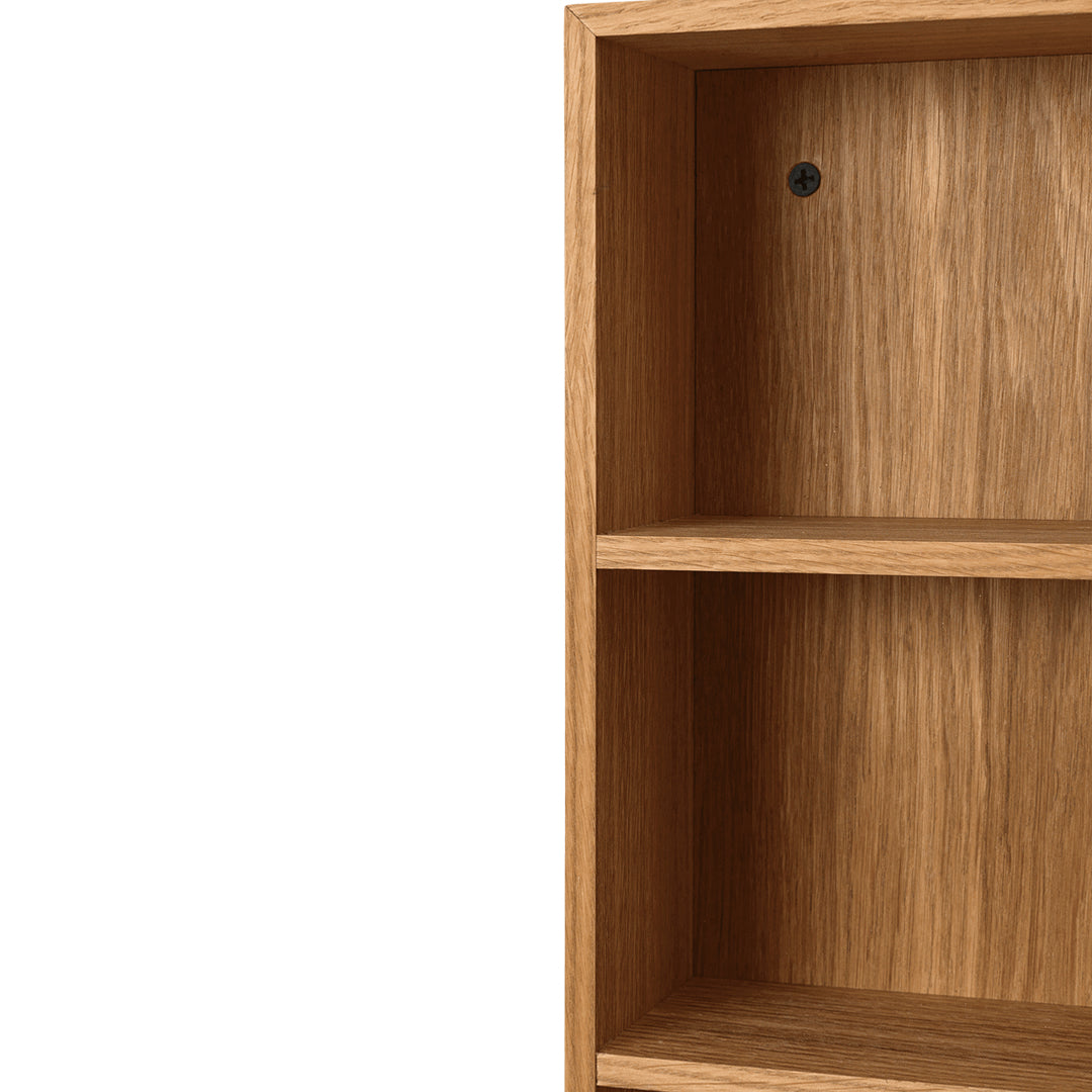 Light oak wood cabinet with a smooth, natural finish and subtle wood grain pattern. Perfect for modern decor.