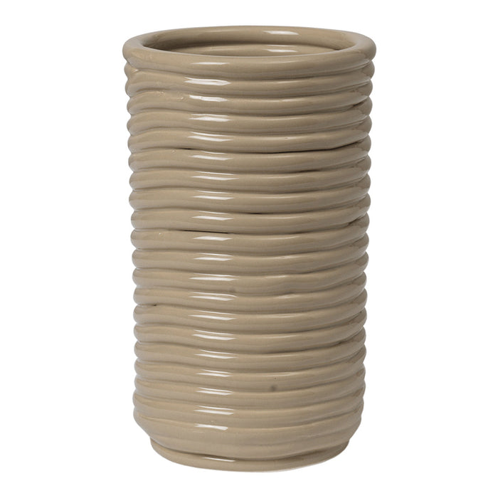 Beige ceramic vase with vertical ribbed texture and smooth, glossy finish. Perfect for modern decor.