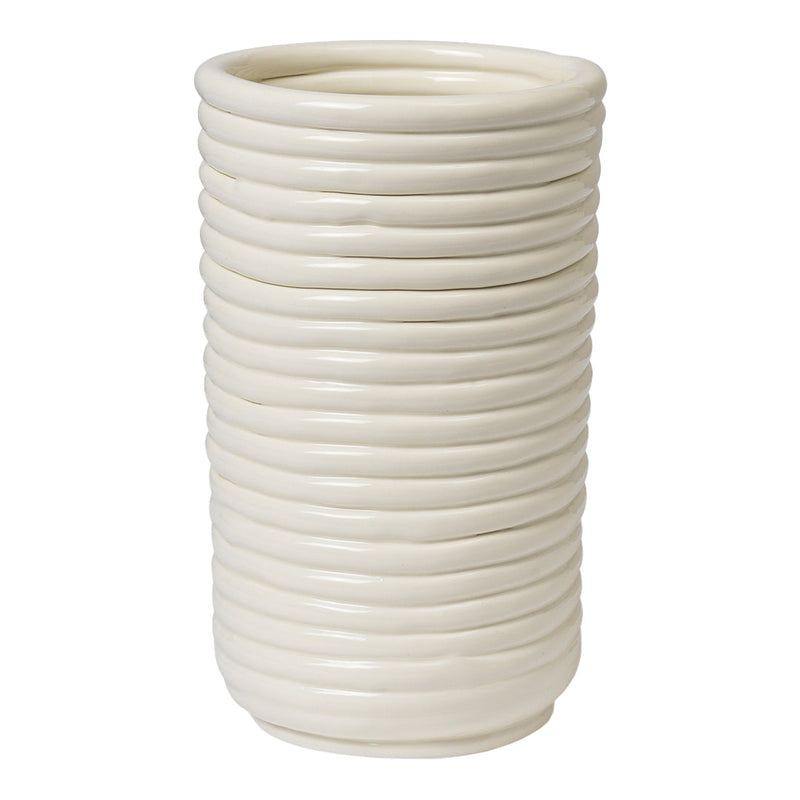 White ceramic vase with a ribbed texture and smooth, glossy finish. Elegant and modern design for home decor.