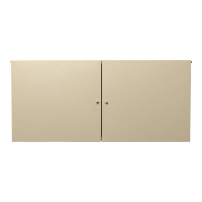 Beige cabinet with a smooth, matte finish and simple, minimalist design. Ideal for versatile home decor.