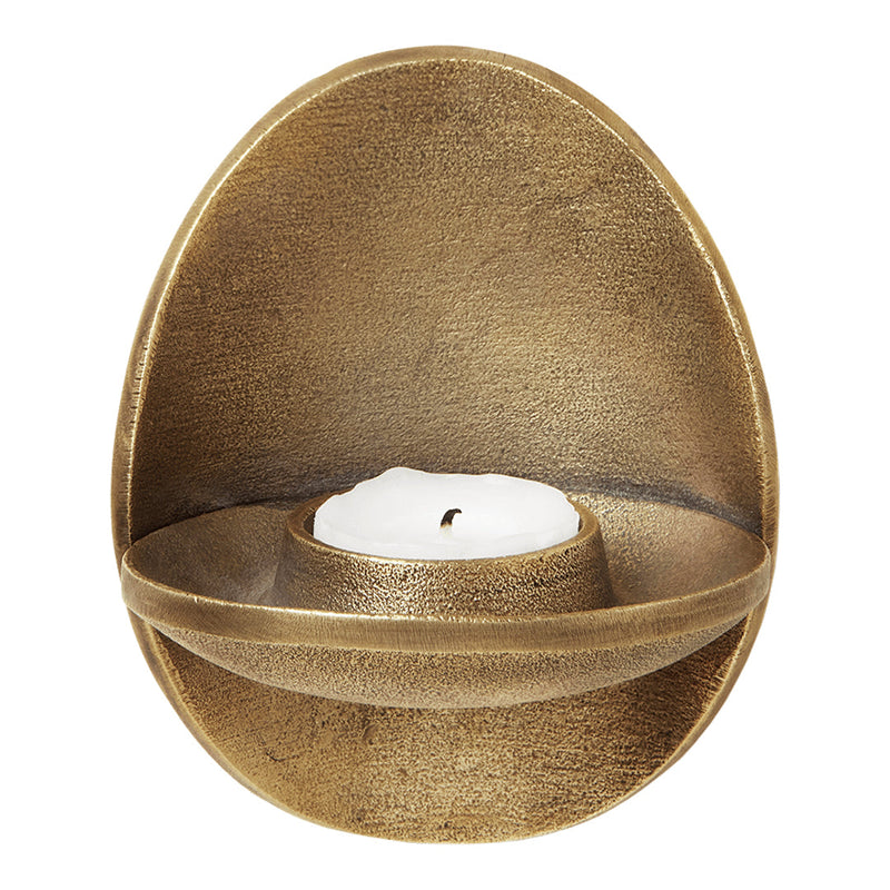 Egg-shaped bronze candle holder with a textured finish and a smooth, white candle. Elegant golden hues and modern design.