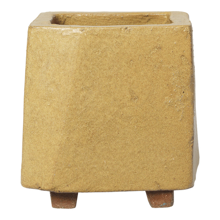 Textured square planter in warm yellow with a matte finish and natural, earthy tones. Perfect for home decor.