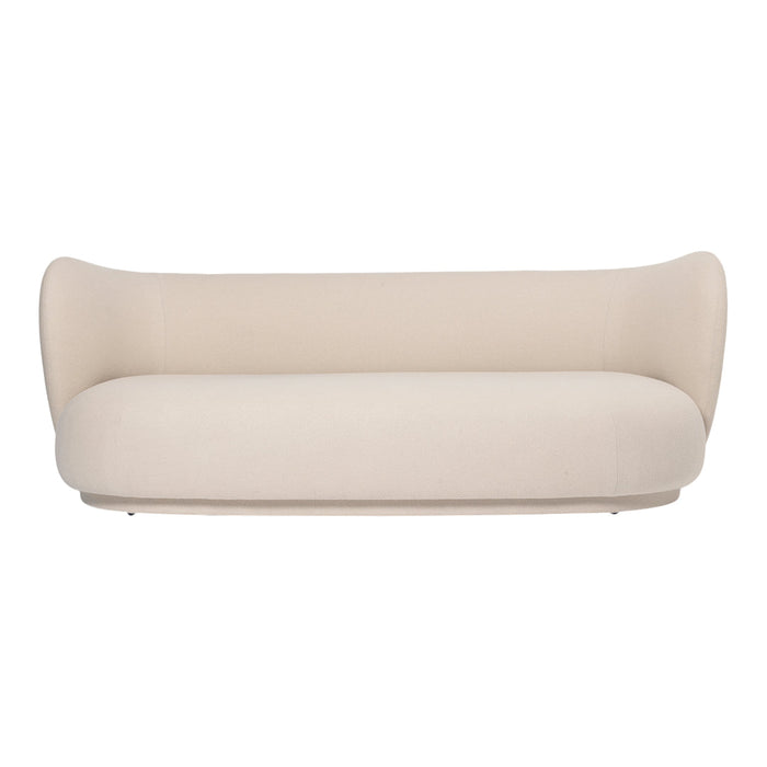 Beige sofa with smooth, curved lines and a minimalist design, accented by a soft, textured fabric.