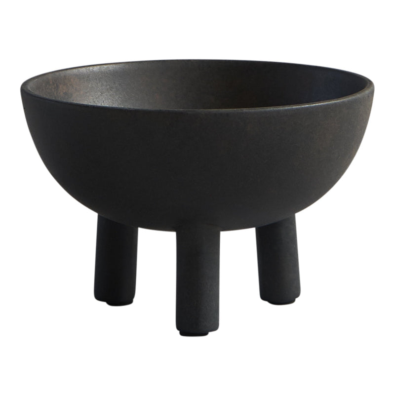 Black ceramic bowl with a smooth finish, featuring three sturdy, short legs. Elegant and modern design.