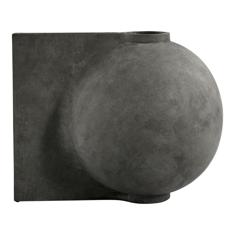 Textured matte black wall sconce with a spherical design, adding a modern touch to any space.