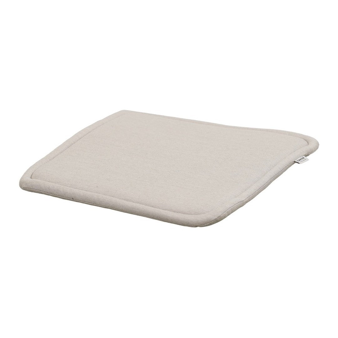 Light beige square cushion with a smooth, textured surface, ideal for home decor and comfort.