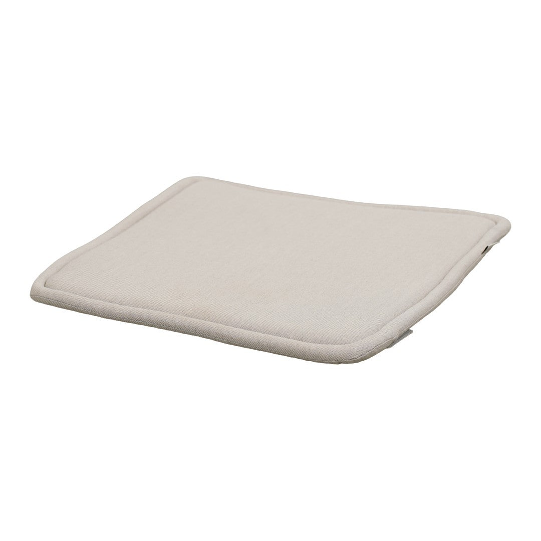Light beige rectangular cushion with a smooth texture and subtle stitched border, perfect for home decor.