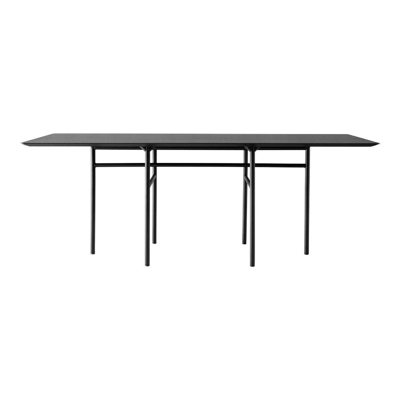 Sleek black rectangular dining table with a minimalist design and smooth surface, ideal for modern interiors.