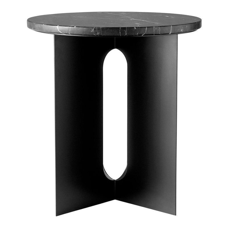 Round black marble top side table with a sleek black metal base, featuring a modern geometric cutout design.