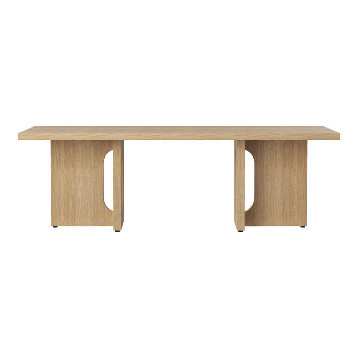 Light wood desk featuring a sleek, minimalist design with natural grain patterns and clean lines.