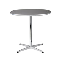 Grey round tabletop with a sleek chrome base, featuring a minimalist design for modern decor.
