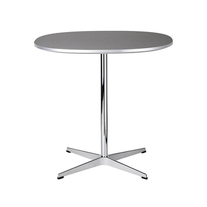 Grey round tabletop with a sleek chrome base, featuring a minimalist design for modern decor.
