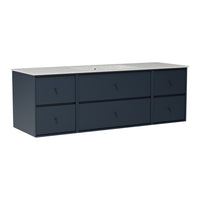 Navy blue dresser with a sleek, minimalist design and six spacious drawers, topped with a light-colored countertop.