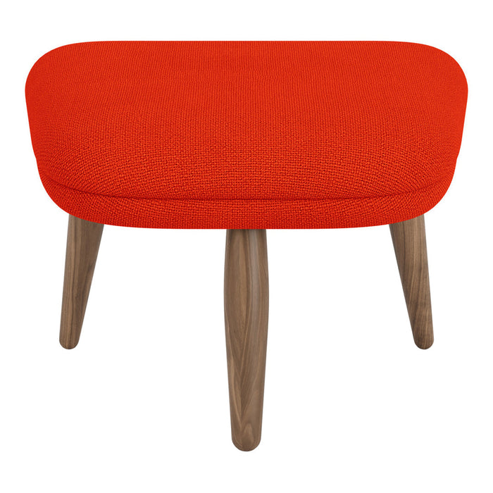 Vibrant red upholstered ottoman with textured fabric and natural wood legs. Perfect accent for modern decor.