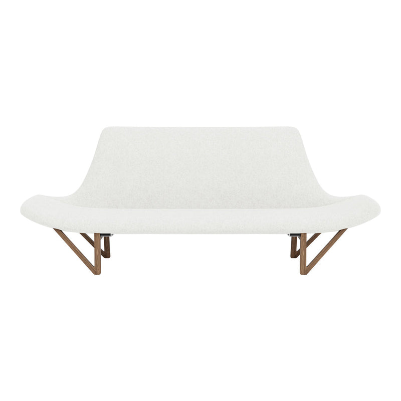 Modern white sofa with soft texture and a light wood base, featuring a minimalist design and elegant curves.