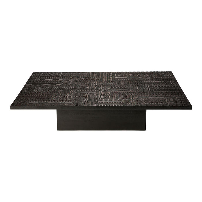 Dark wooden coffee table with a textured, geometric pattern on the surface, featuring a sleek black base.