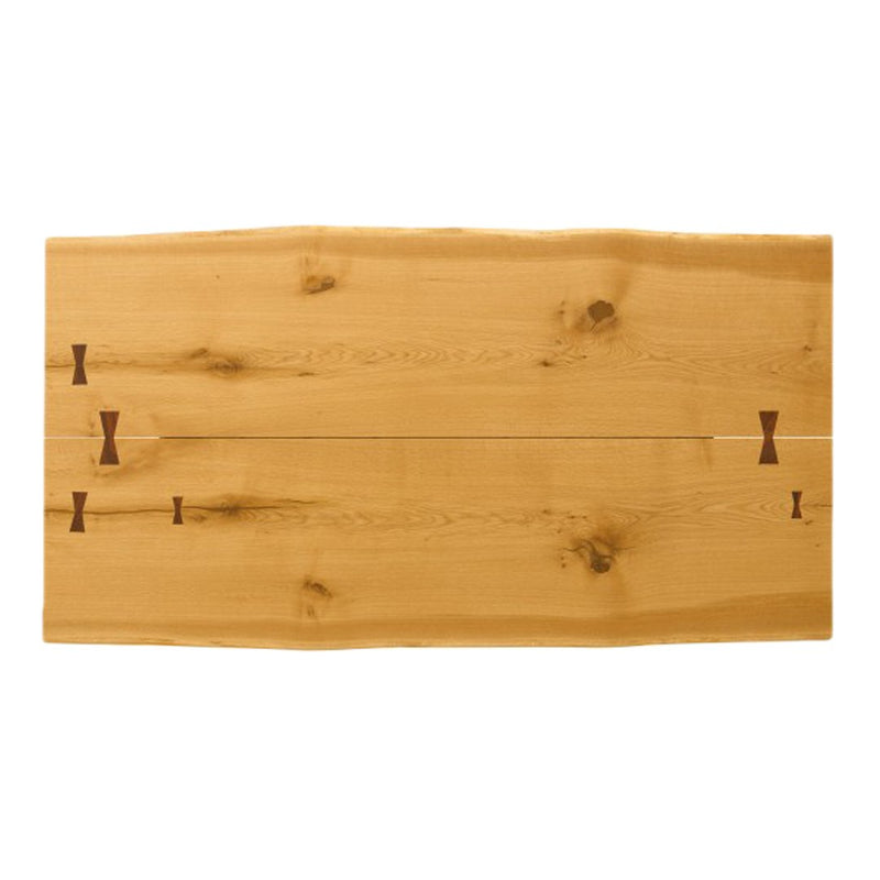 Natural wood table surface with light honey tones and subtle grain patterns, featuring dark inlay details.